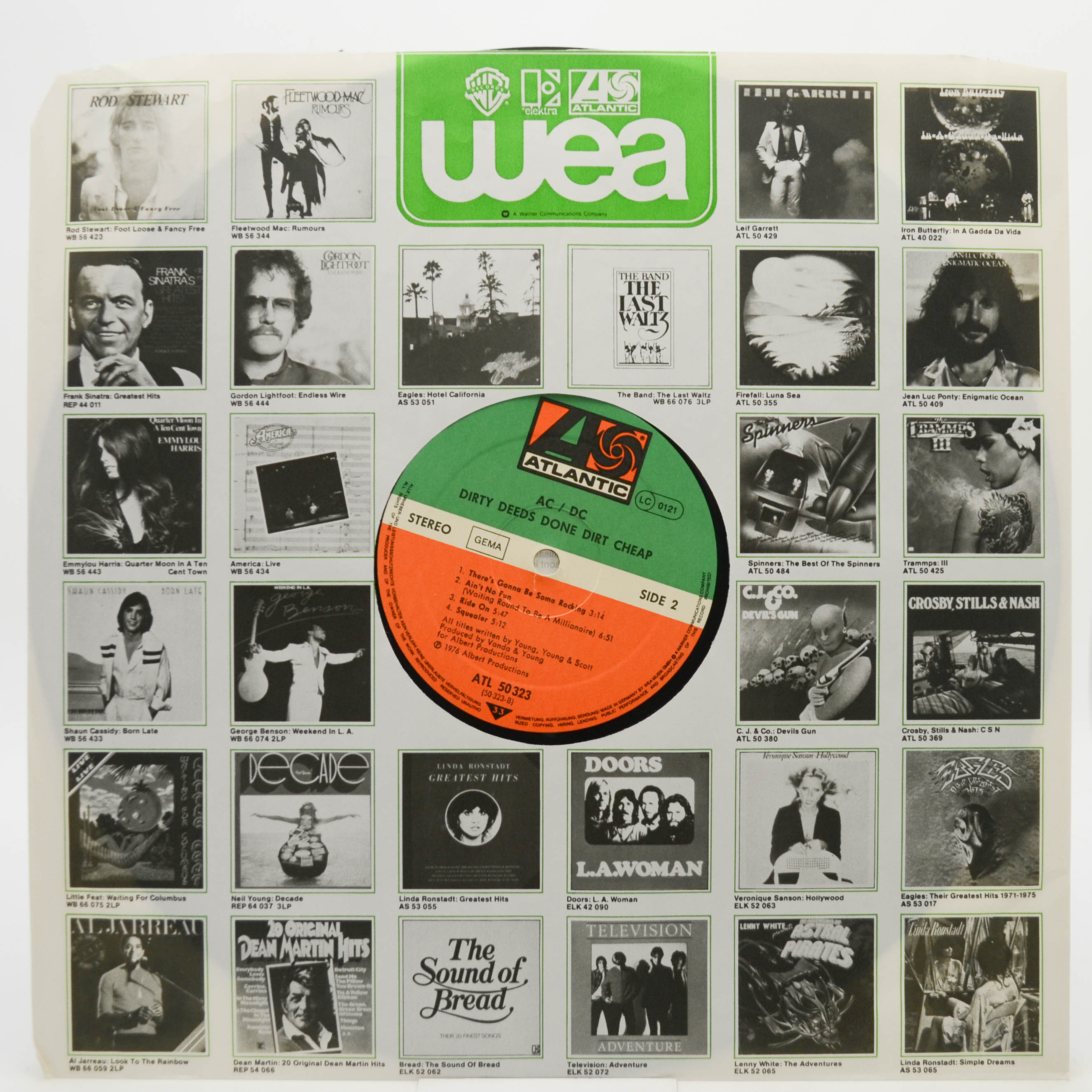 AC/DC — Dirty Deeds Done Dirt Cheap, 1976