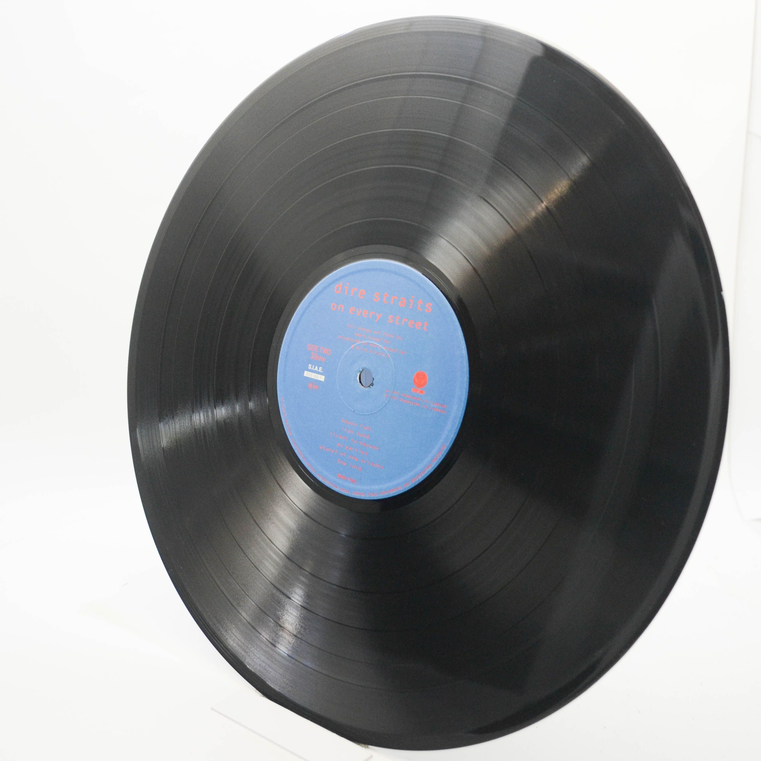 Dire Straits — On Every Street, 1991