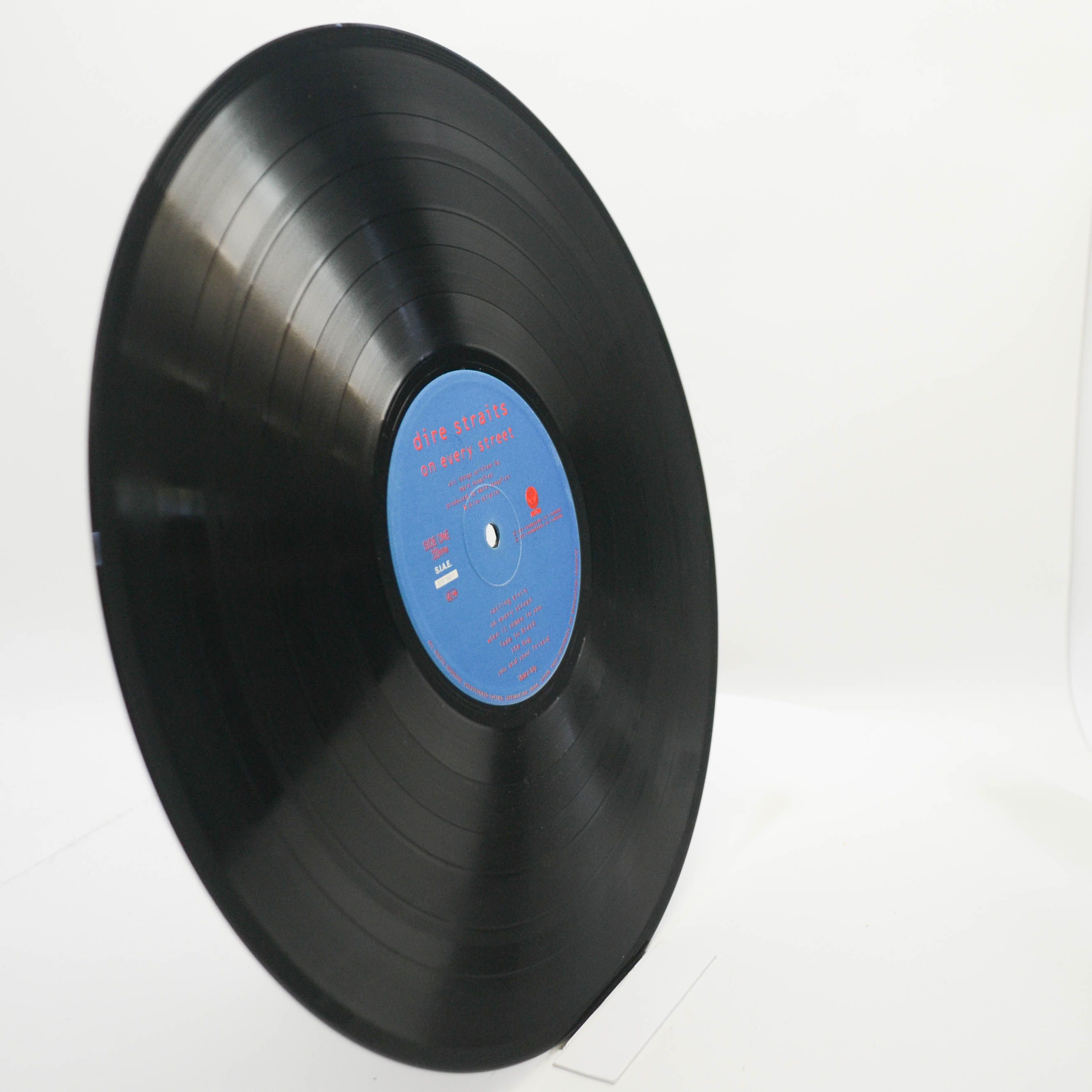 Dire Straits — On Every Street, 1991