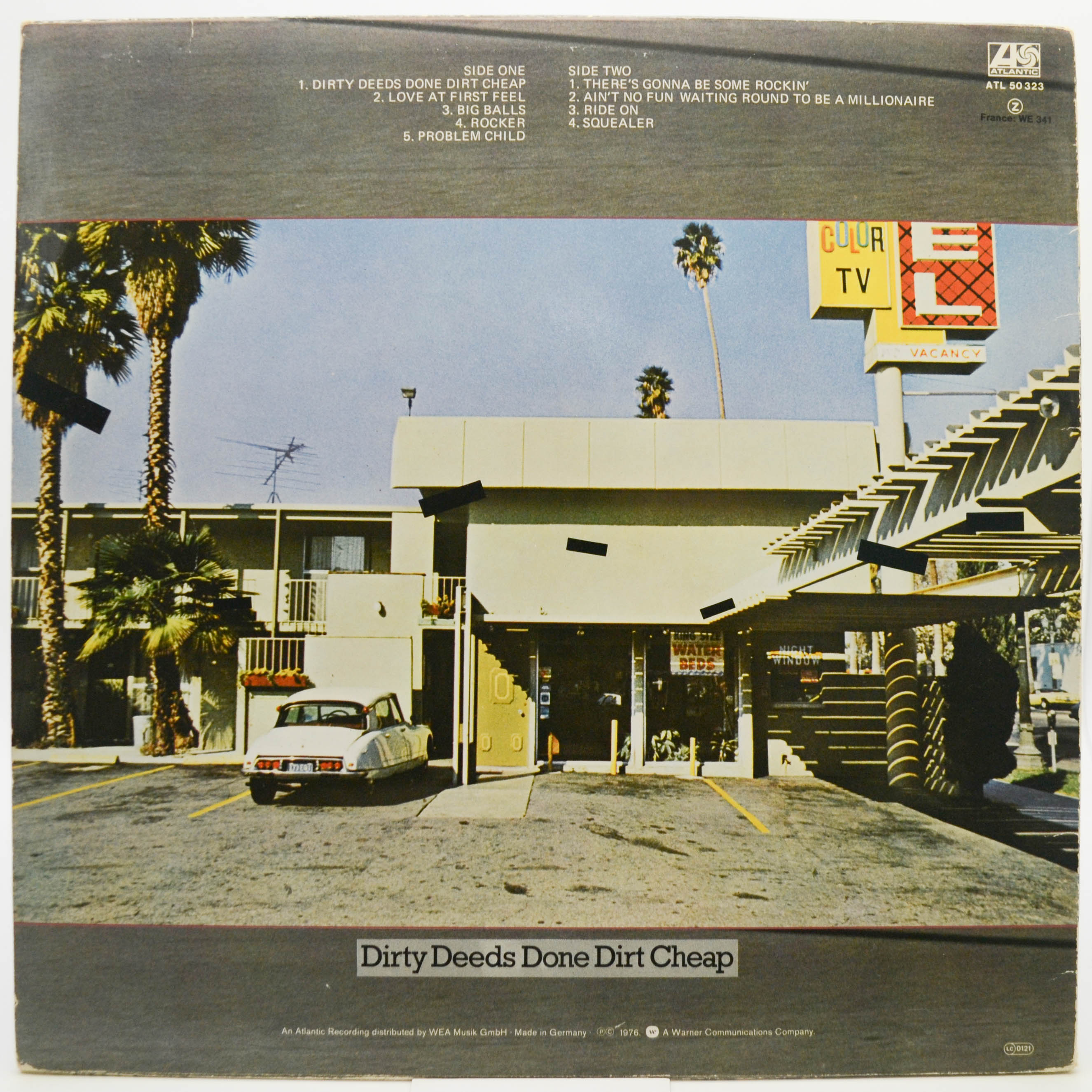 AC/DC — Dirty Deeds Done Dirt Cheap, 1976