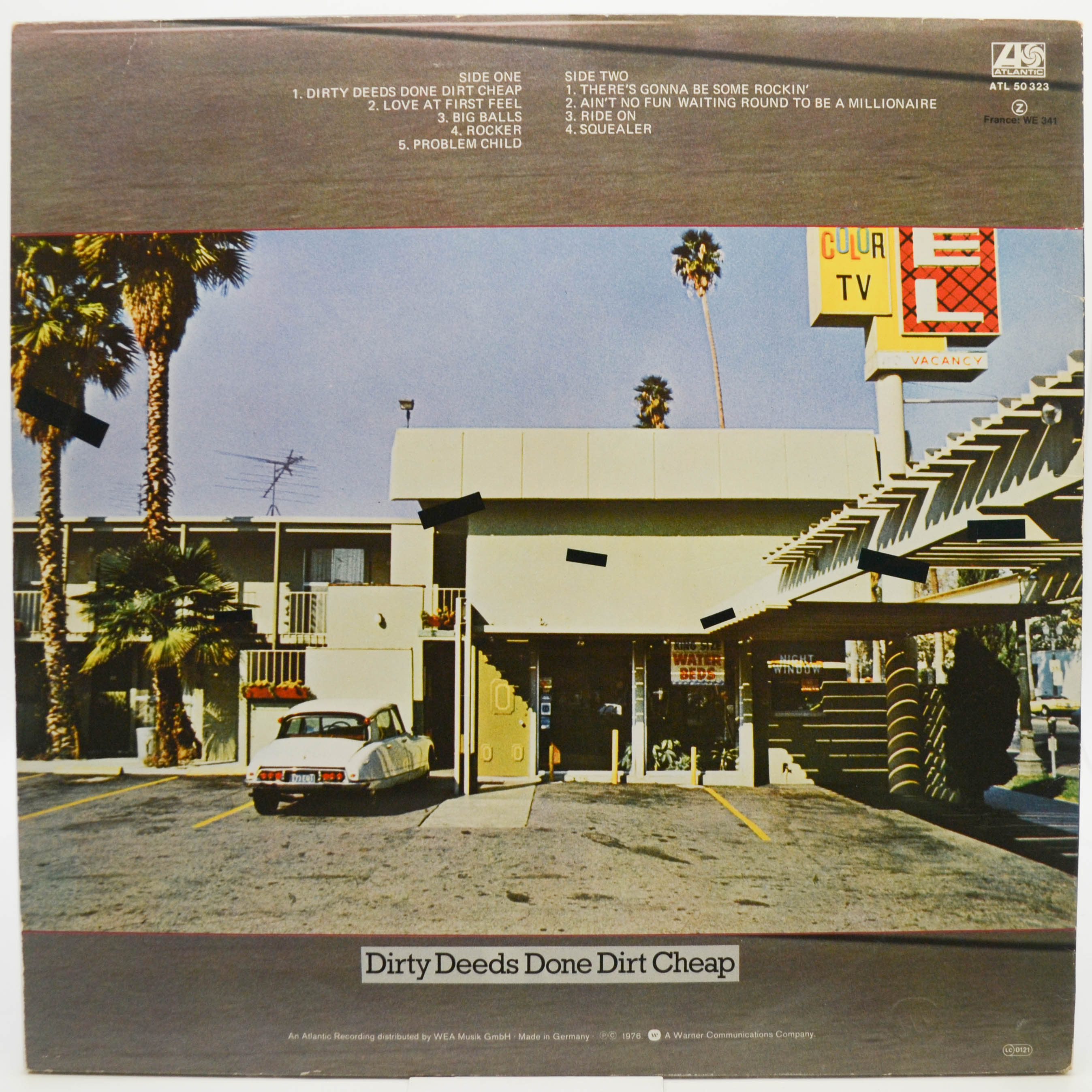 AC/DC — Dirty Deeds Done Dirt Cheap, 1976