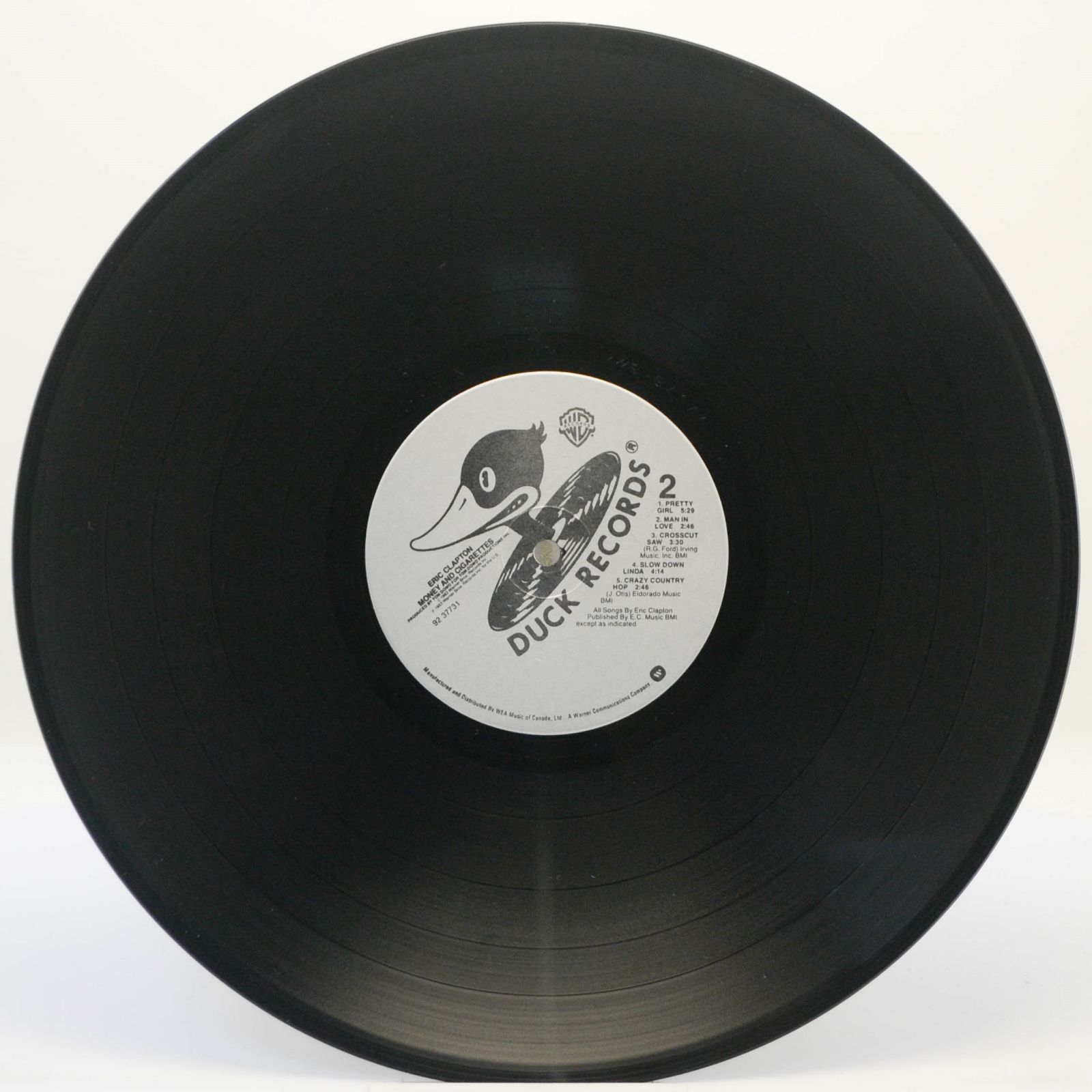 Eric Clapton — Money And Cigarettes, 1983