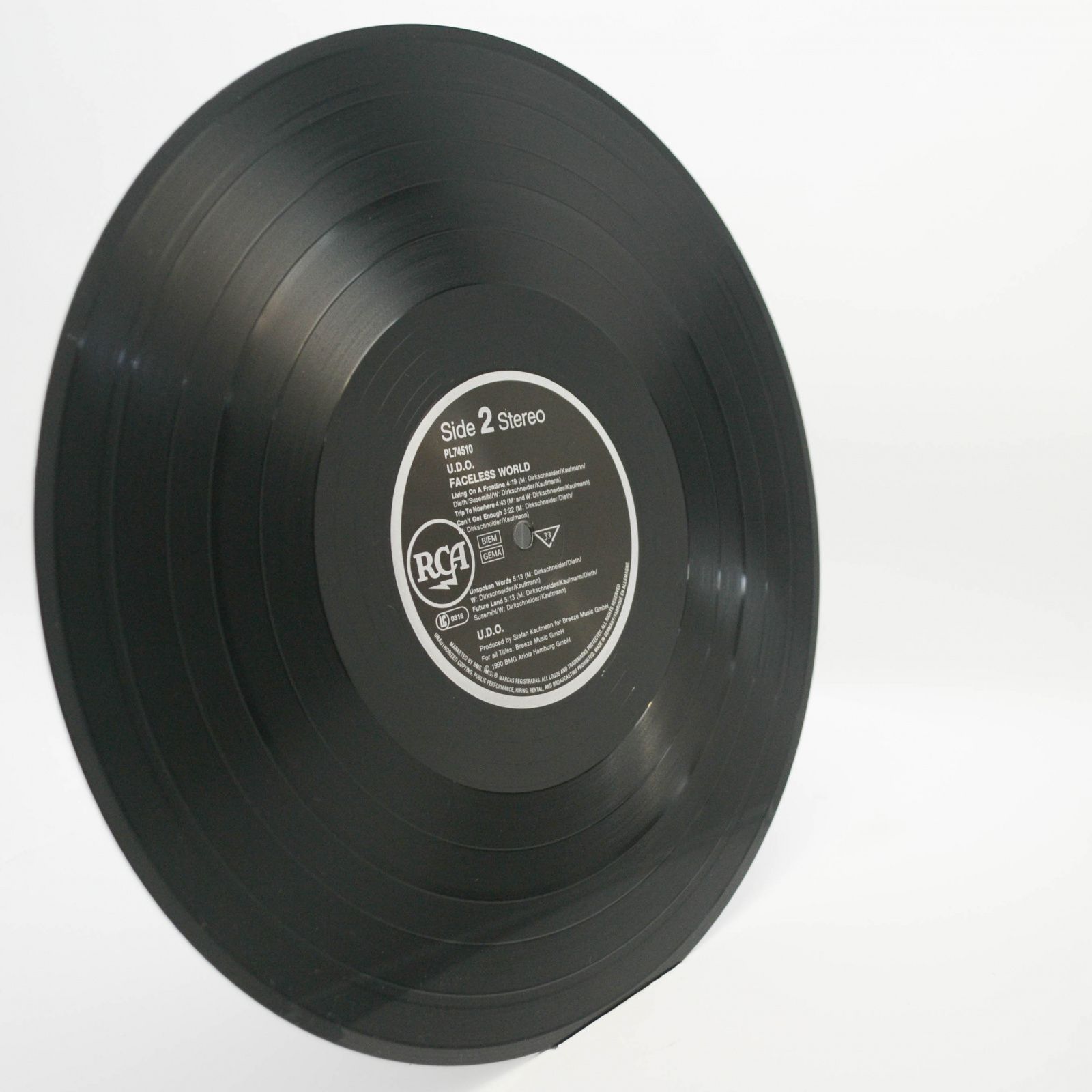 U.D.O. — Faceless World, 1990